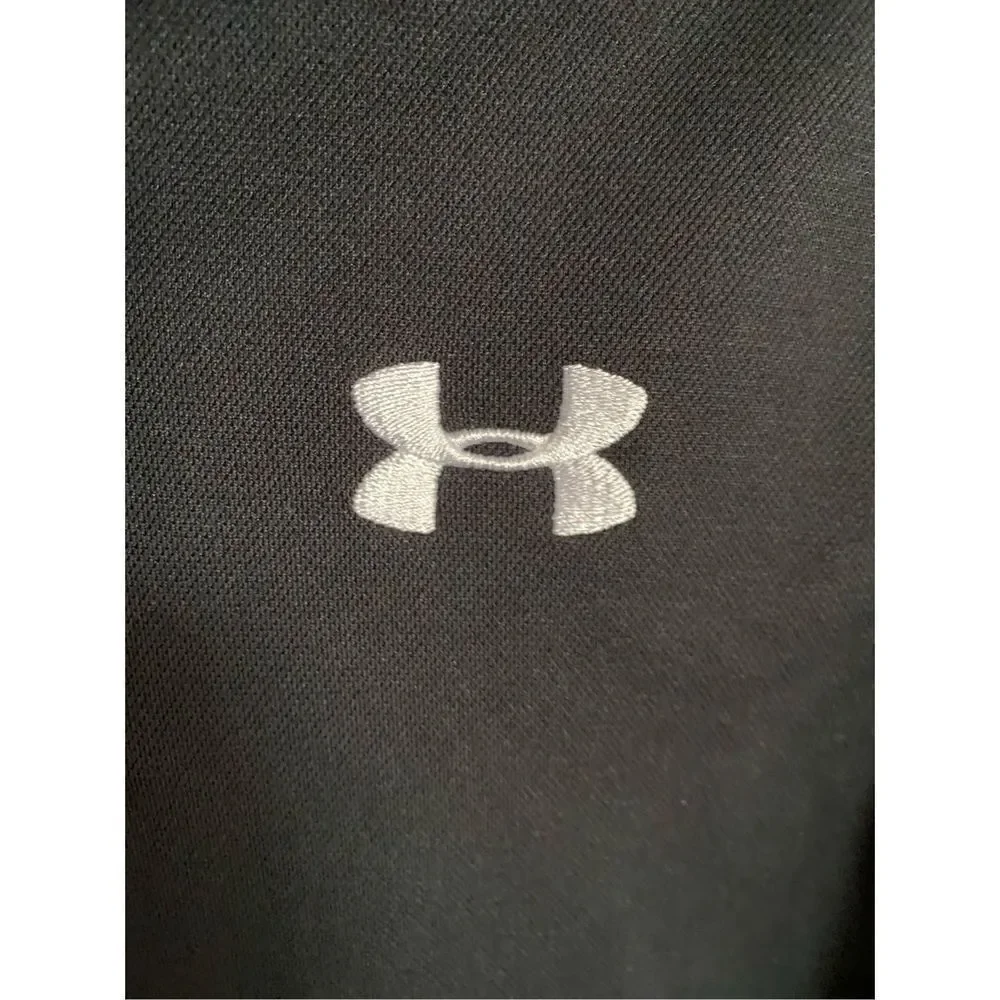 Under armor NWOT boys, black loose heat, guard polo, short sleeve top /small